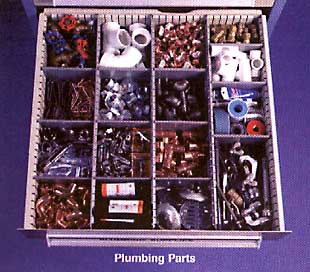 Plumbing parts in a modular drawer